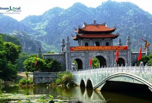 Hoa Lu, featuring ancient temples nestled amidst stunning limestone karsts and lush landscapes in Ninh Binh province.