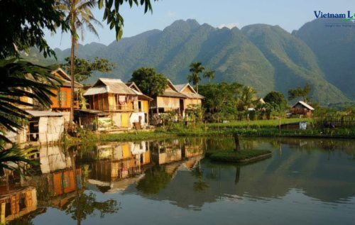 Mai Chau, is a serene valley enveloped by lush greenery and stilt houses.